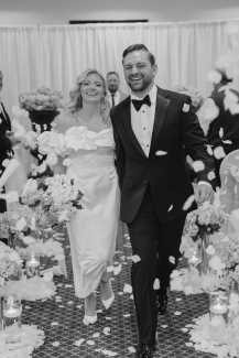 William and Abigail walk down the aisle on their wedding day