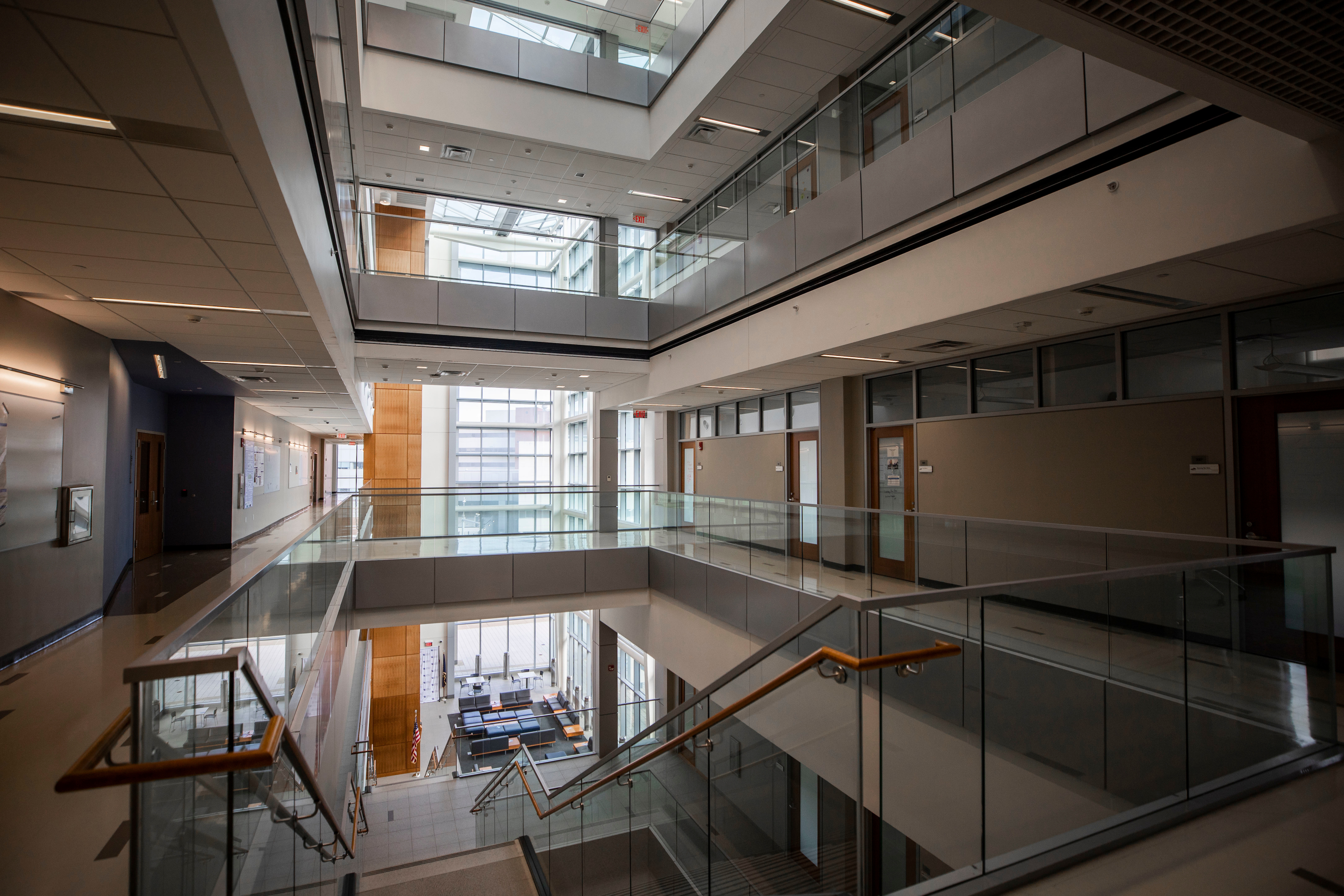 inside of building on second floor looking out into an atrium