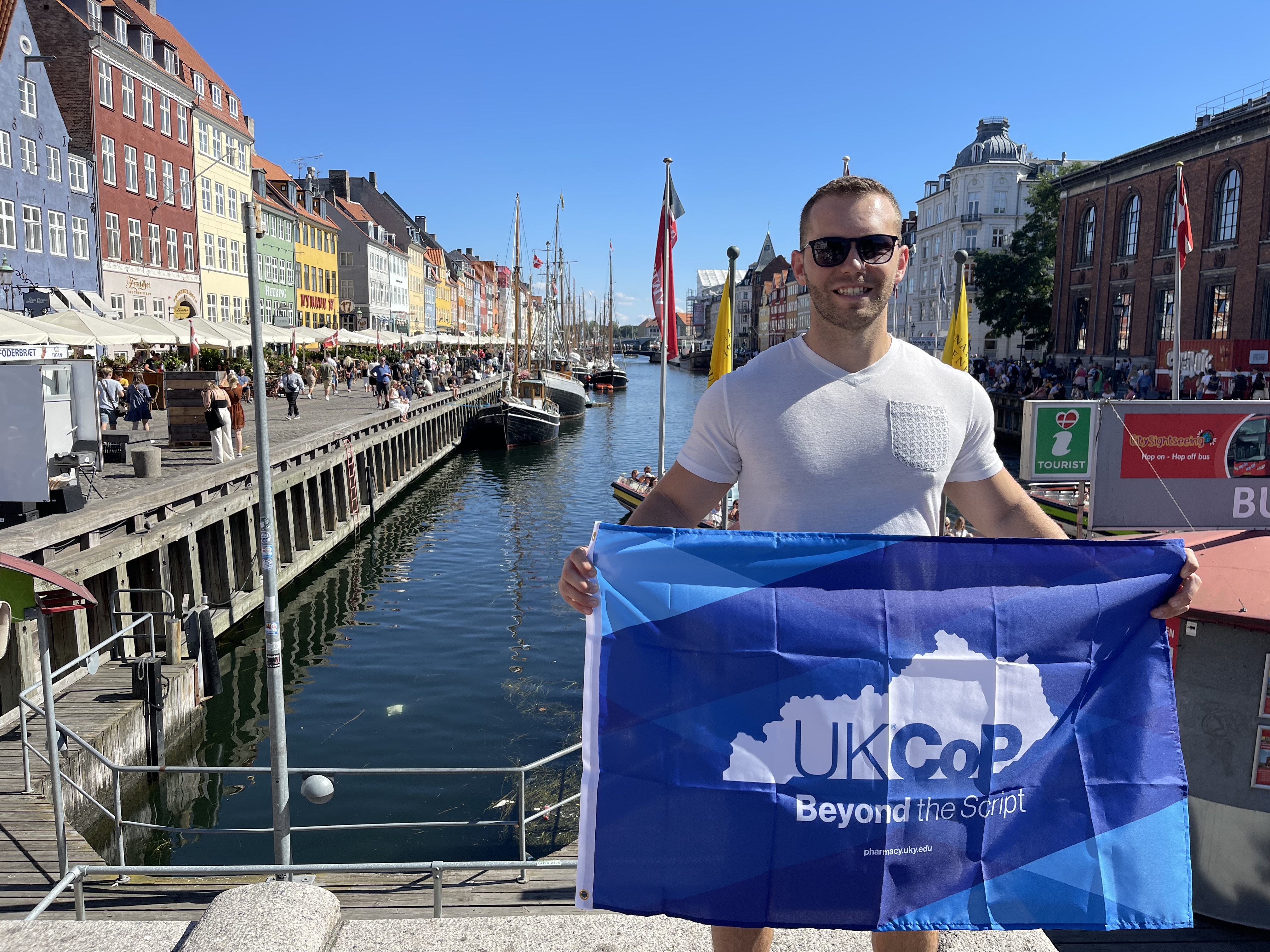 Dustin Miracle standing in front of river in Copenhagen