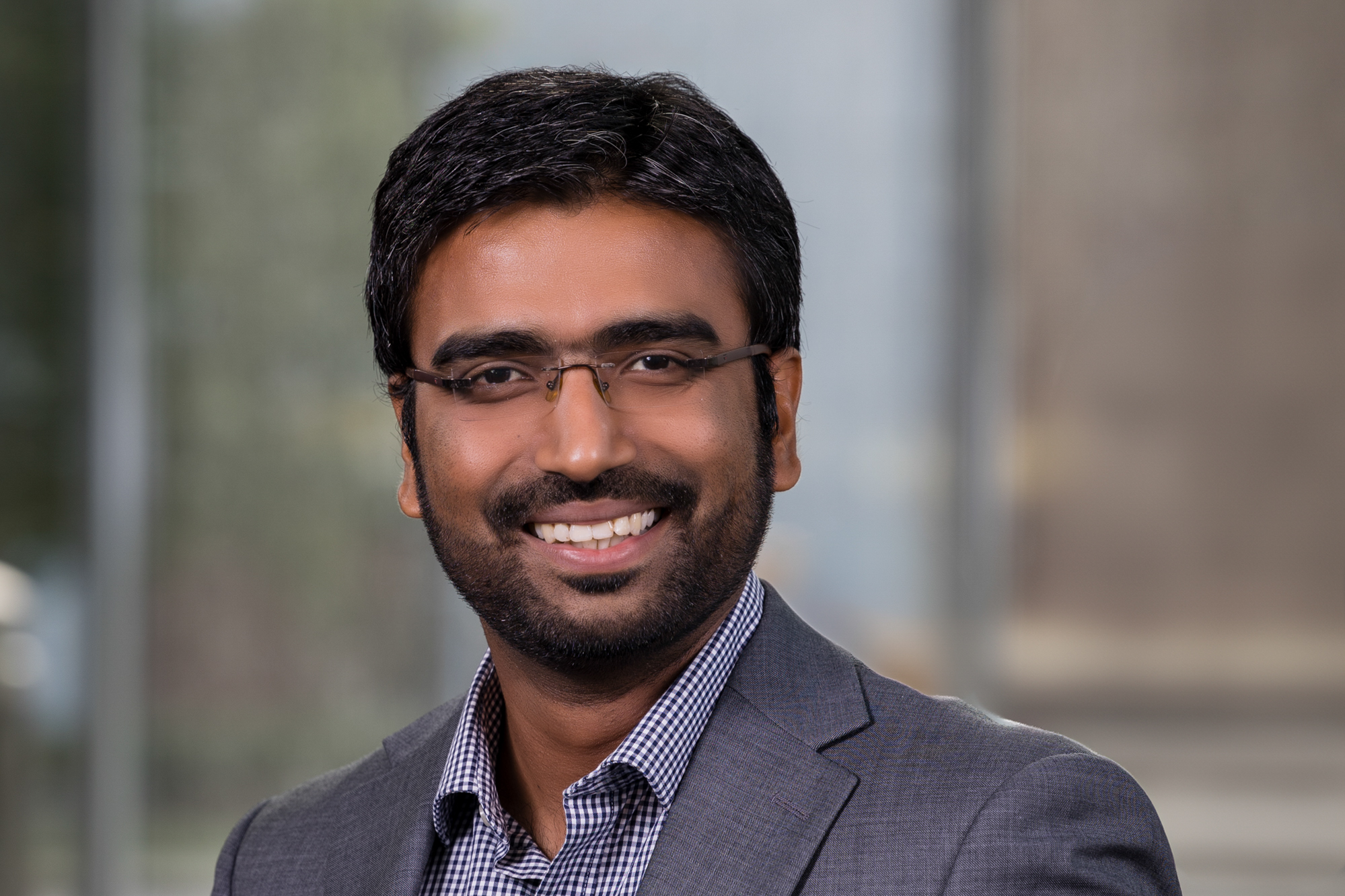 Man wearing glasses smiling