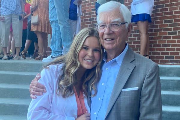 PY1 Raegan Borders with grandfather Bill Borders at the 2022 White Coat Ceremony