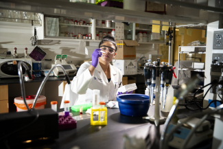 female student in research lab