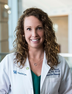 Brittany Bissell wearing a white coat in the TODD Building