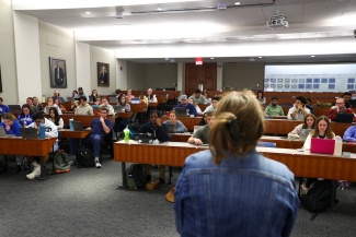 professor lecturing in a pharmacy classroom