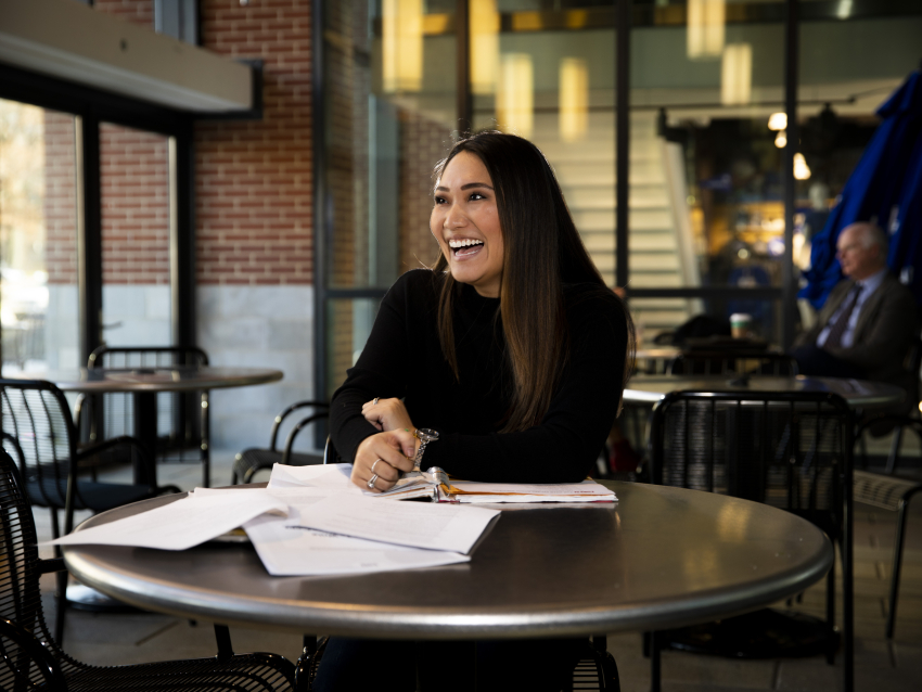 student in student center studying