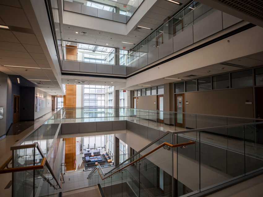 inside of building on second floor looking out into an atrium
