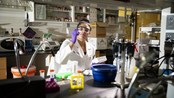 female student in research lab