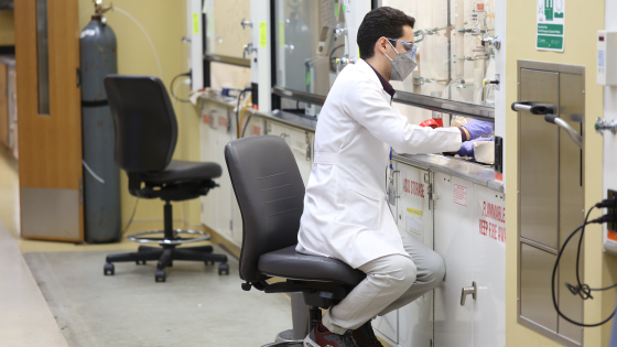 scientist sitting in lab working