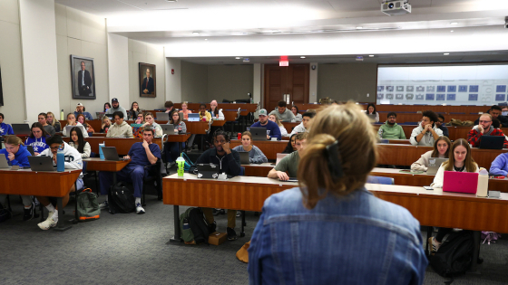 professor lecturing in a pharmacy classroom