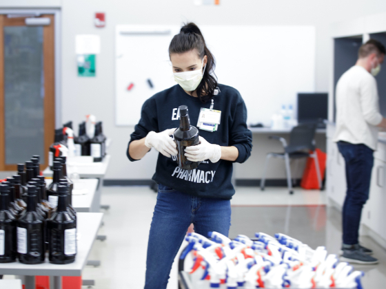 Student making hand sanitizer