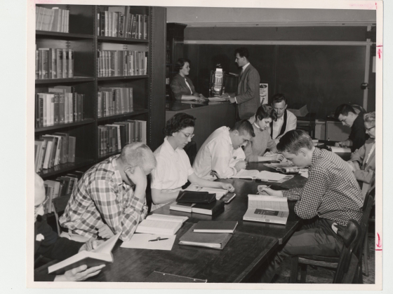 students studying at pharmacy library 1958