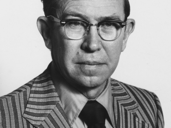 paul f. parker in a suit and tie