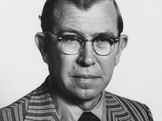 paul f. parker in a suit and tie