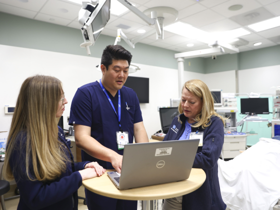 residents having discussions with their preceptor