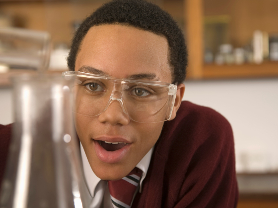 young student conducting a science experiment